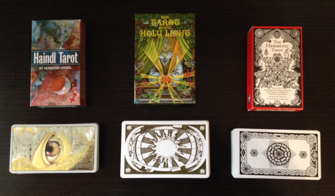 Tarot Decks (left to right): Haindl, Holy Light, and Hermetic