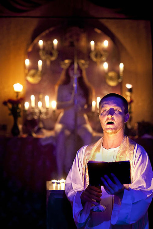 Gnostic Mass at OTO Temple (Ordo Templi Orientis) NEW ORLEANS, LA. A naked goddess sits on the altar as the priest recites his prayers. The Alombrados Oasis of Ordo Templi Orientis is a Thelemic initiatory fraternity started by Aleister Crowley, a practitioner of magical arts, who lived in New Orleans around 1916. During the mass the goddess energy is celebrated.