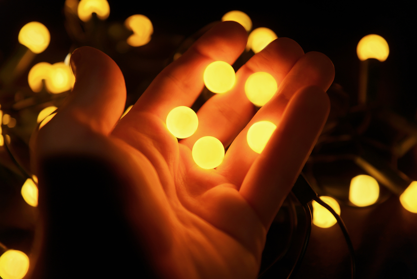 Bright yellow balls in the hands of a man